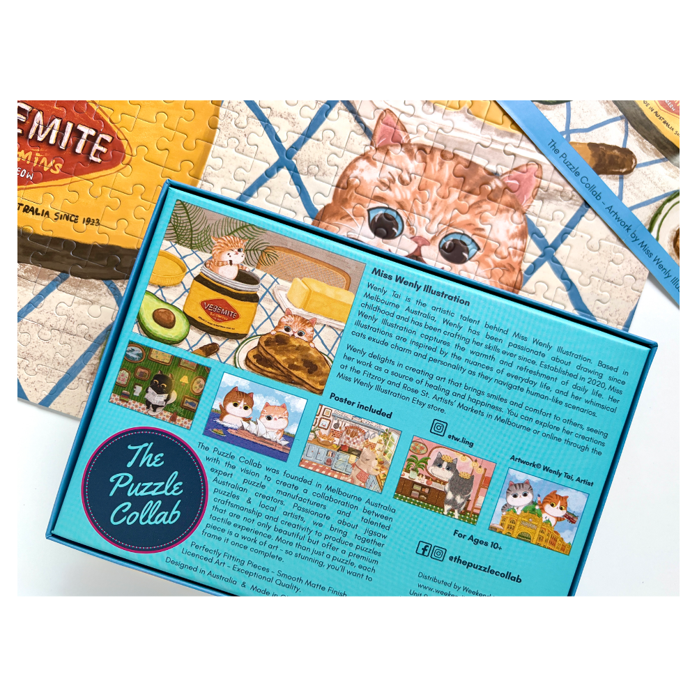 The Puzzle Collab jigsaw puzzle box shown at an angle, revealing the back cover with illustrations of cats and coffee-themed scenes, placed over a completed puzzle featuring a large cat face.