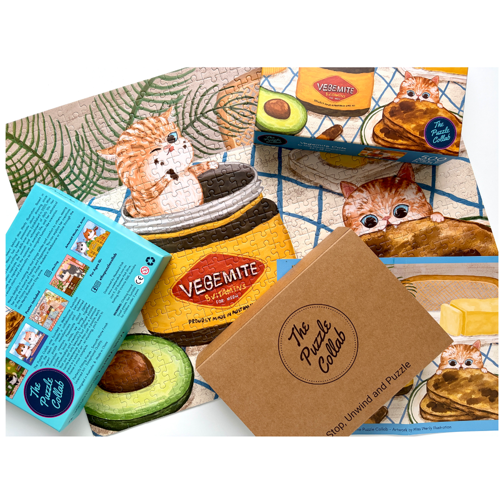 A collage of puzzle-related items from The Puzzle Co Ltd, including a completed cat-themed jigsaw puzzle, its blue packaging box, a brown cardboard box, and a Vegemite-themed puzzle.